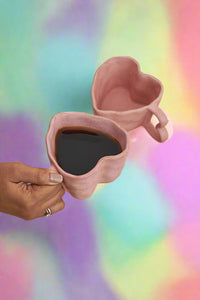 large ceramic heart shaped mug in pink